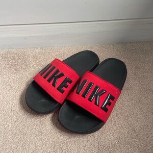 Red Nike slides
